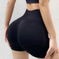 Högmidjade yogashorts med magkontroll och lyftande passform