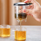 Ett-klicks glas tekanna med löstagbar infusionssil