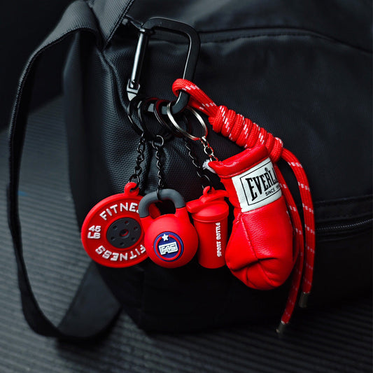 Söt mini-nyckelring med gymaccessoar