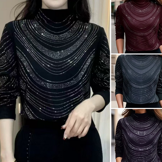 Elegant långärmad damtröja med paljetter