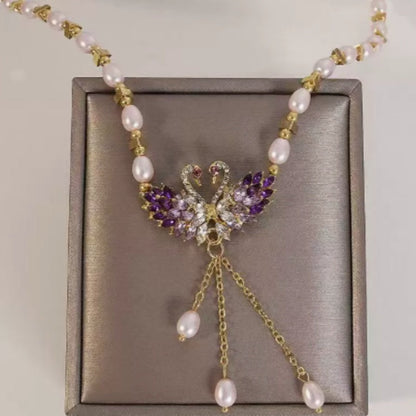 🦢💜 Romantiskt halsband med dubbla svanhängslen
