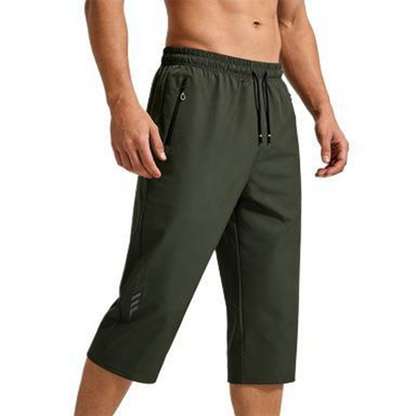 🩳 50% RABATT! ✨ 3/4-joggingbyxor för herrar – Snabbtorkande & lätta – Elastisk midja & dragkedjefickor – perfekt för sport, resor eller varma dagar 🏃‍♂️