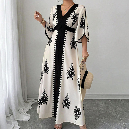 👗 50 % RABATT! 🌸 Elegant V-ringad maxiklänning – smickrande passform, luftig & mönstrad, perfekt för bröllop, middag & strand 🌿
