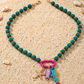 Vibrant Boho Kusthalsband med Pärlor