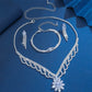 Elegant smyckeset med lotusmotiv och strass